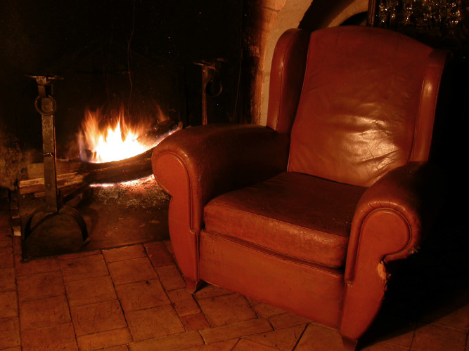 FAUTEUIL CLUB à OREILLES en CUIR circa 1940